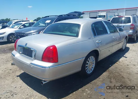 2004 Lincoln Town Car Ultimate из США, поврежденный, VIN 1LNHM83W14Y688714